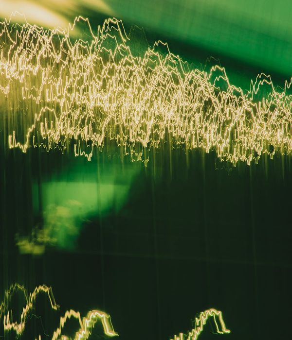 Abstract mint colored glowing waves symbolizing inner energy flow